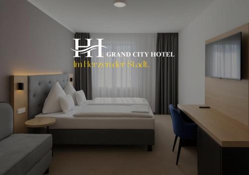 Postel nebo postele na pokoji v ubytování HI Grand City Hotel