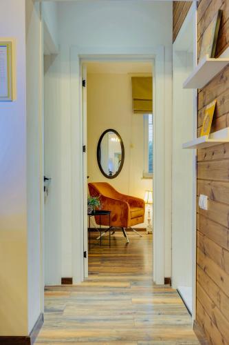 a hallway leading to a bedroom with a bed at Entire Villa Near Tbilisi Nature Reserve with Panoramic View in Mtskheta
