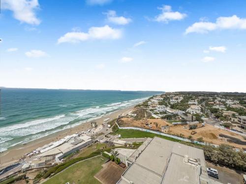 an aerial view of a beach and the ocean at The Sharon Sunset Loft in Herzliya B