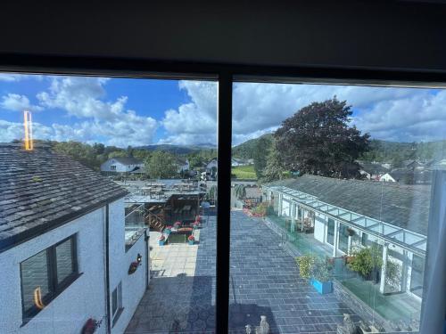 a view of a street from a window at Ambleside Rooms & Suites in Ambleside