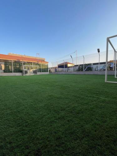 an empty soccer field with a soccer goal at Oriana - your sanctuary escape in Amman