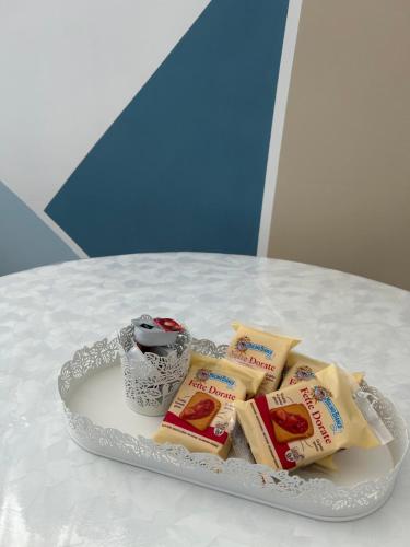 a tray of food on top of a table at Villa Luce 2 in Casaletto Lodigiano