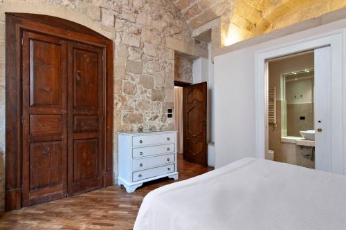Chiesa Greca Suites - Lecce Selectionにあるベッド