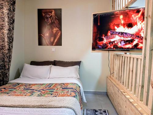 Ένα ή περισσότερα κρεβάτια σε δωμάτιο στο Revered Apartments
