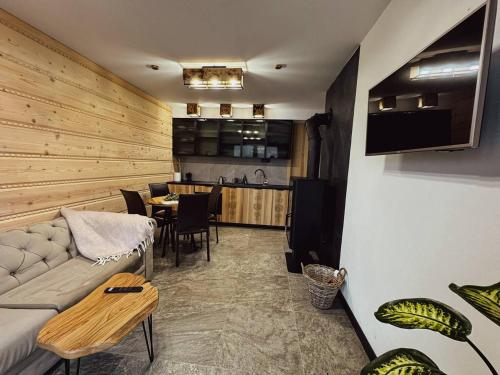 Η κουζίνα ή μικρή κουζίνα στο Schronisko Zmysłów - Apartament 1