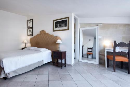 Chiesa Greca Suites - Lecce Selectionにあるベッド
