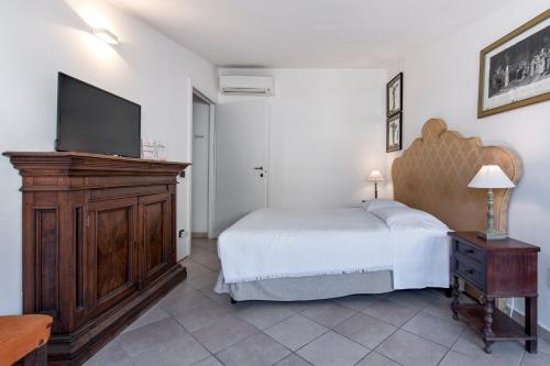 Chiesa Greca Suites - Lecce Selectionにあるベッド