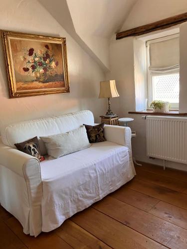 Ένα ή περισσότερα κρεβάτια σε δωμάτιο στο Ferienhaus Vulkaneifel Landhaus Loogh