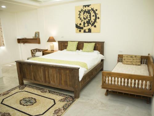 Postel nebo postele na pokoji v ubytování Home & Teak Residence