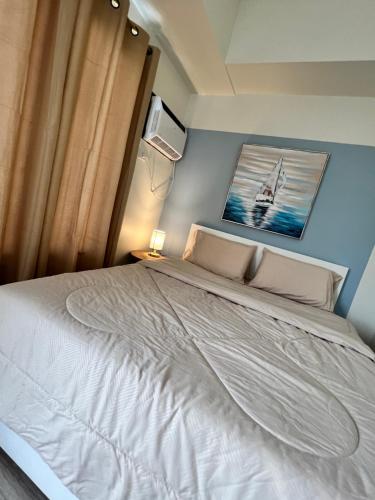 Postel nebo postele na pokoji v ubytování The Median 1209