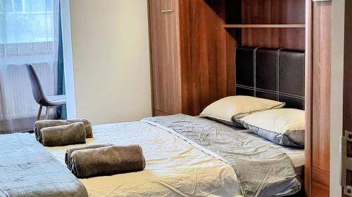 Katil atau katil-katil dalam bilik di Apartment in the heart of Iasi