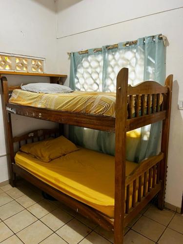 Ένα ή περισσότερα κρεβάτια σε δωμάτιο στο Casita en la playa