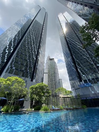 a view of two tall buildings in a city at Premier Suites Twin Towers at Star Residences in Kuala Lumpur