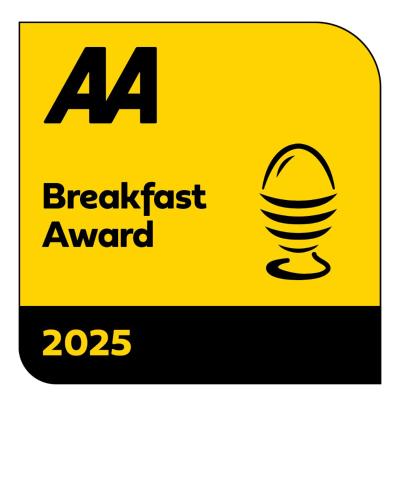 a sign for a breakfast award with a microphone at Rowan House B&B Rooms & A Self Catering Apartment in Lochgoilhead