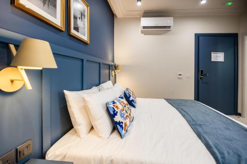 Postel nebo postele na pokoji v ubytování Buena Vista Suites