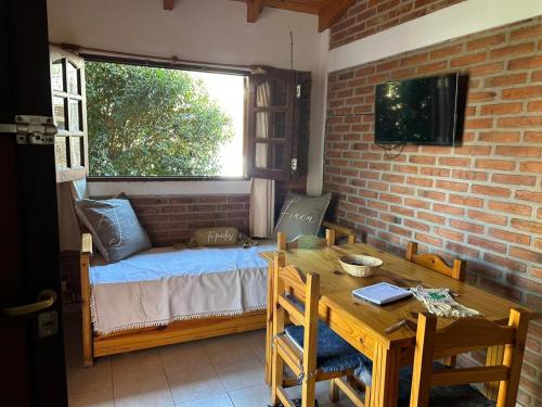 Postel nebo postele na pokoji v ubytování La Hormiga