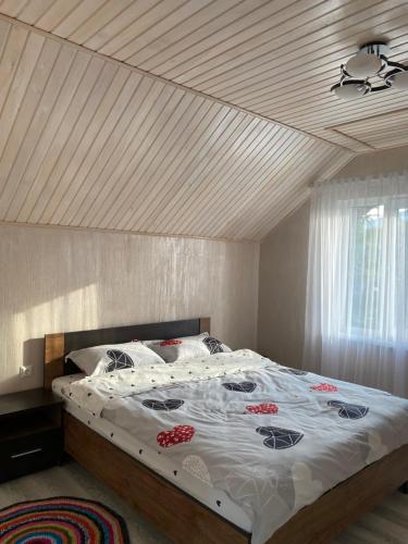 Ένα ή περισσότερα κρεβάτια σε δωμάτιο στο Guta House