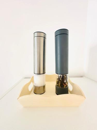 a couple of blenders sitting on a table at Mola Apartments- Trendiges Apartment in der City-Nähe Dortmund-Terrasse-3 Gäste-WLAN in Herdecke