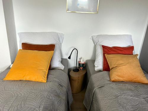Кровать или кровати в номере FR- moderne Wohnung, WLAN, Smart-TV, voll ausgestattete Küche