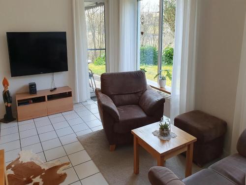 TV a/nebo společenská místnost v ubytování Eifel Escape Cozy & Scenic