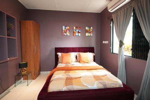 Katil atau katil-katil dalam bilik di Lukas Garden Accra with Pool, Jacuzzi & Gym
