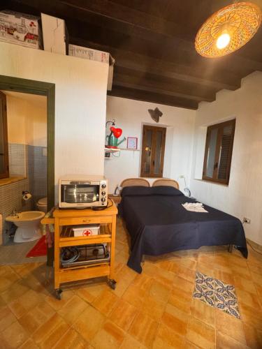 Postel nebo postele na pokoji v ubytování Casa Vacanze Bombolino