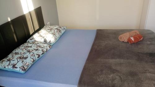 Ein Bett oder Betten in einem Zimmer der Unterkunft Pousada Maranata Canoas