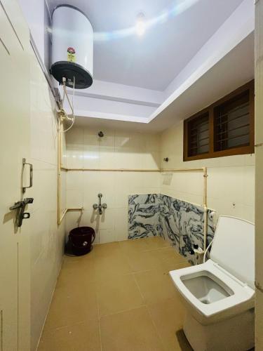 Et badeværelse på Balajiresidency Lodge