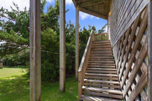 a wooden staircase on the side of a house at 8455 - Mad Hatteras in Avon