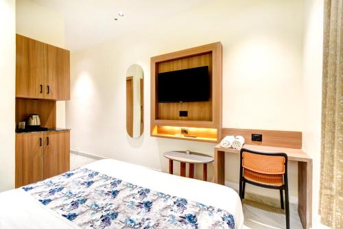 Η κουζίνα ή μικρή κουζίνα στο Hotel Royal Ican Sindhubhavan Road