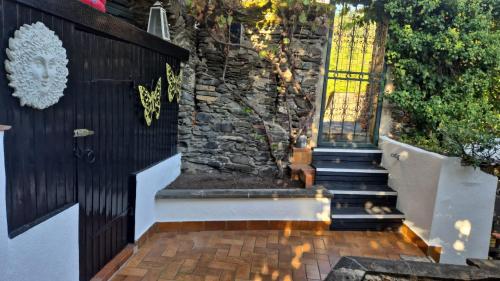 a entrance to a house with a gate and stairs at Haus Sofia in Cochem