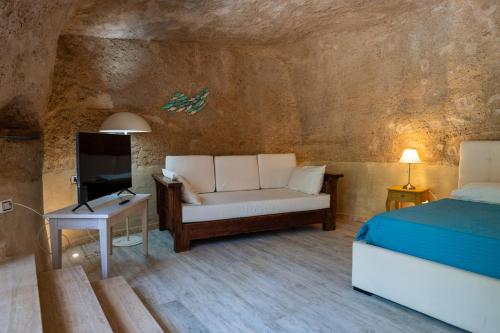 Giường trong phòng chung tại Fuori Rotta Holiday Home