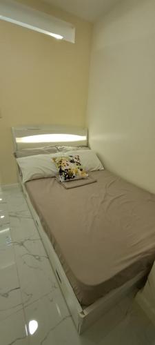 Katil atau katil-katil dalam bilik di Casa Vides at Victoria Sports Tower beside GMA Kamuning MRT Station