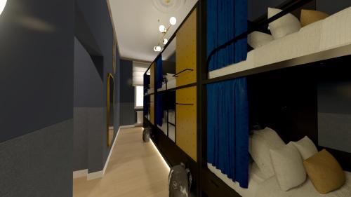 Ένα ή περισσότερα κρεβάτια σε δωμάτιο στο dreamfactory - Hostel Krakow