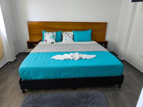 Postel nebo postele na pokoji v ubytování Apartamentos Brisas de la Rivera
