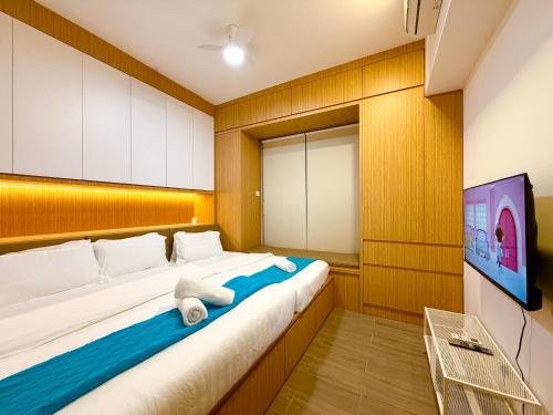 Μια τηλεόραση ή/και κέντρο ψυχαγωγίας στο Bay Premier Suites by SSVC