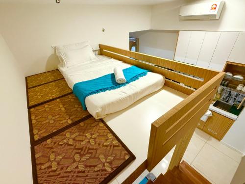 Ένα ή περισσότερα κρεβάτια σε δωμάτιο στο Bay Premier Suites by SSVC
