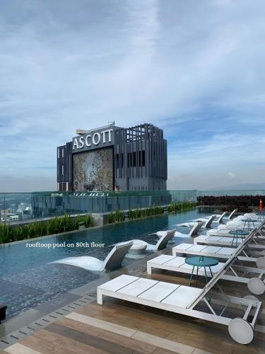 a rendering of a resort with a pool and a hotel at Premier Suites Twin Towers at Star Residences in Kuala Lumpur
