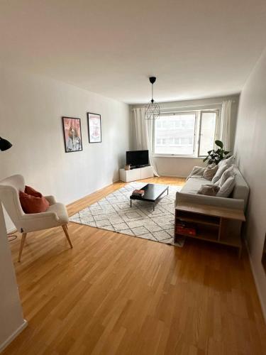 Foto A cozy two bed apartment near the riverside 1