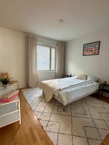 Foto A cozy two bed apartment near the riverside 2