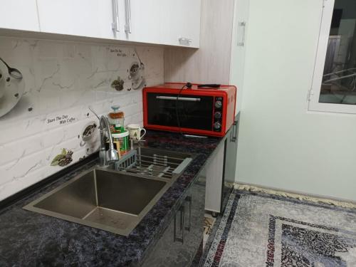 Una cocina o zona de cocina en Apartement in Bukhara