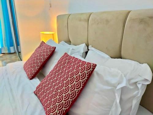 เตียงในห้องที่ Skyland immo