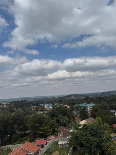 a view of a city under a cloudy sky at Anny's bnb in Ngong