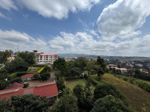 a view of a city with a building and trees at Anny's bnb in Ngong