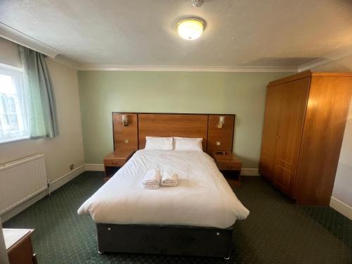 Rivenhall Garden Hotelにあるベッド