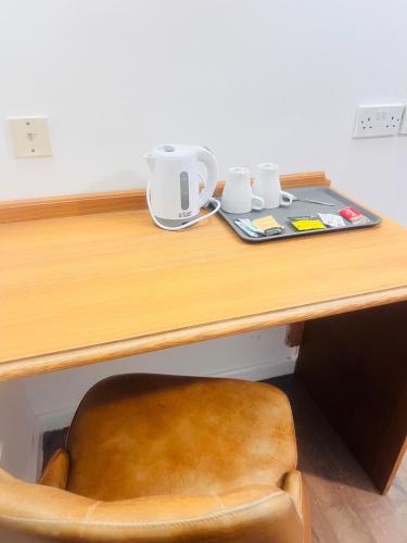 Rivenhall Garden Hotelにあるコーヒーまたはお茶