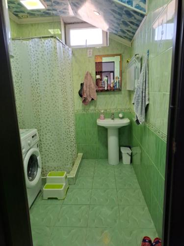 Ένα μπάνιο στο Aihan guest house