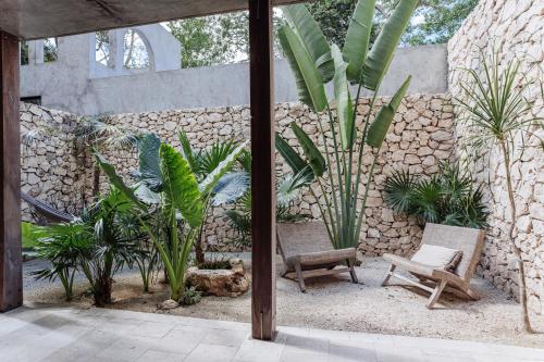 Κήπος έξω από το Onze Xpu Ha Sanctuary, Tulum