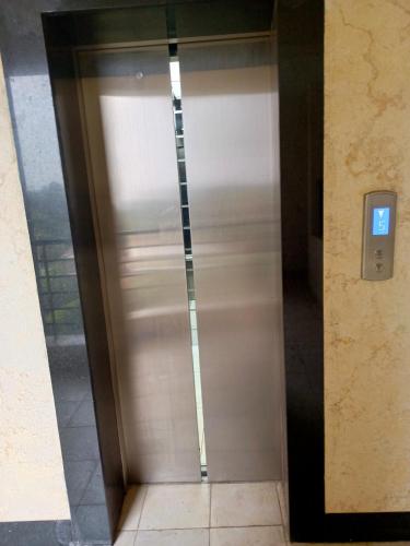 a elevator in a building with its door open at Anny's bnb in Ngong