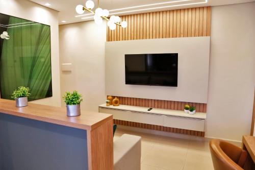 Et tv og/eller underholdning på Moderno ao lado do Shopping